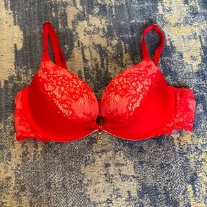 Never worn. Victoria Secret bra red with lace and crystal detail. 32B